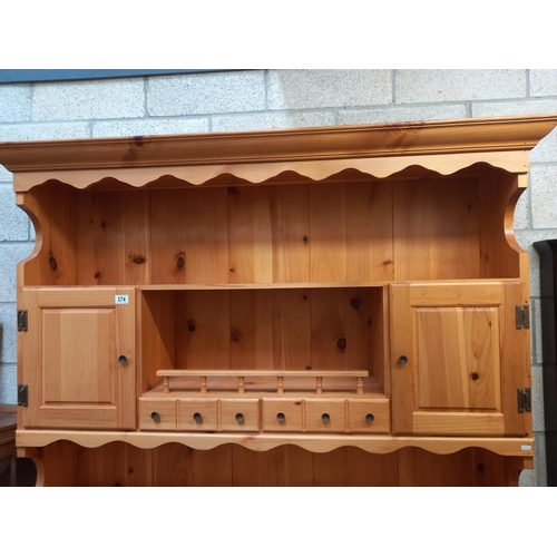 374 - A large solid pine dresser COLLECT ONLY