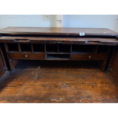 389 - A Victorian oak single pedestal roll top desk. COLLECT ONLY.