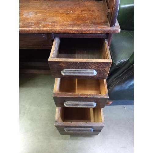 389 - A Victorian oak single pedestal roll top desk. COLLECT ONLY.