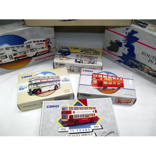 1003 - Quantity of boxed Corgi buses including Stagecoach set