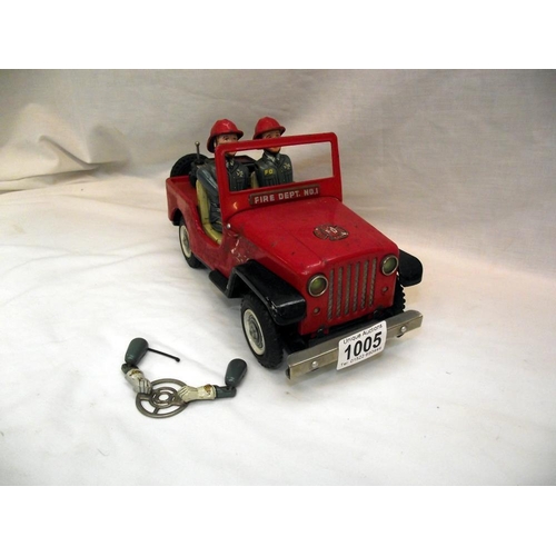 1005 - A vintage Nomura battery operated fire department Jeep, untested, base is loose