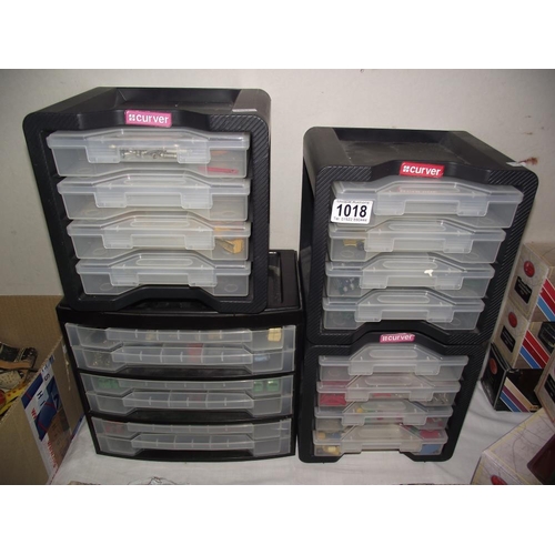 1018 - 4 plastic storage drawers/units containing Lesney diecast vehicles