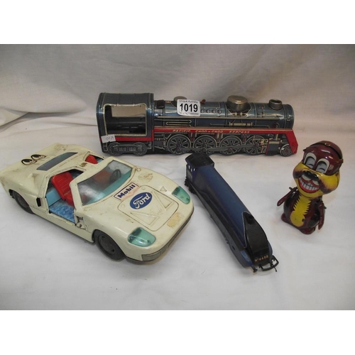 1019 - A Japanese Bandai battery operated Ford GT 40 a/f and Kanto toys, train Hornby Sir Nigel Gresley etc