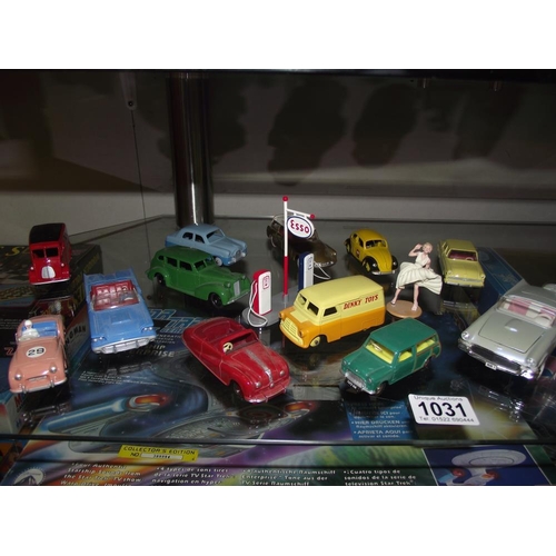 1031 - 12 unboxed Atlas Dinky replicas and a Corgi Marilyn Monroe Ford Thunderbird