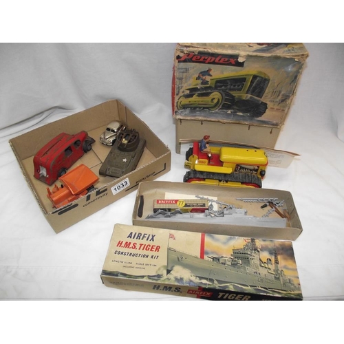 1033 - A boxed Arnold Germany bulldozer, Tri-ang Minic including Morris Minor etc