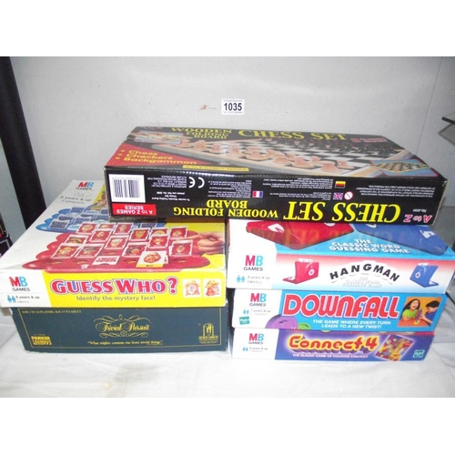 1035 - A quantity of games including a chess set, Trivial Pursuit, Hangman etc