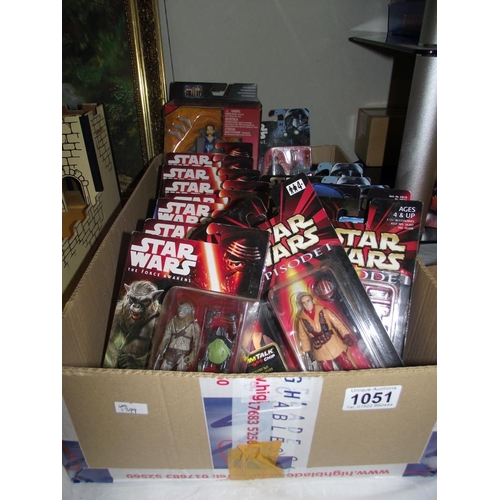 1051 - A box of Star Wars force awakens Rogue 1 and episode 1 figurines, still carded