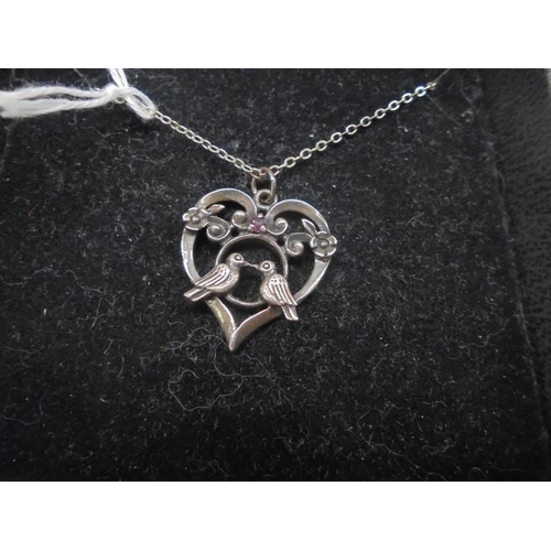 1005 - A boxed Franklin Mint silver 'The Birds of Love Valentine Pendant'.