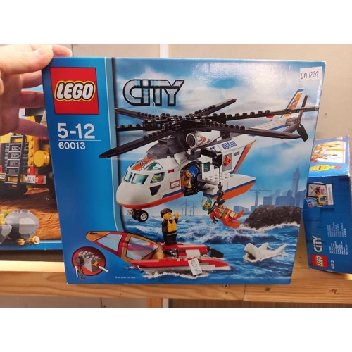 1128 - 5 boxed and unopened Lego city sets