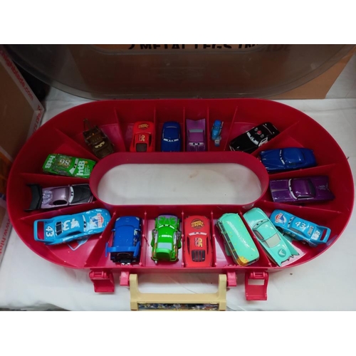 1144 - 2 'Disney Cars' carry cases filled with diecast models from the Lightning McQueen movie, 33 cars in ... 