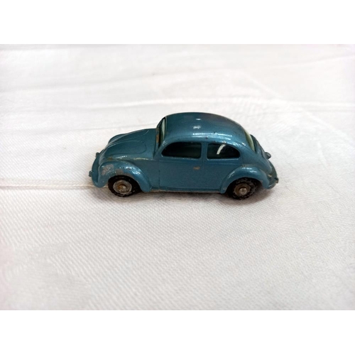 1170 - A Lesney no 25 Volkswagen beetle metallic blue with blue tinted window, black base and black painted... 