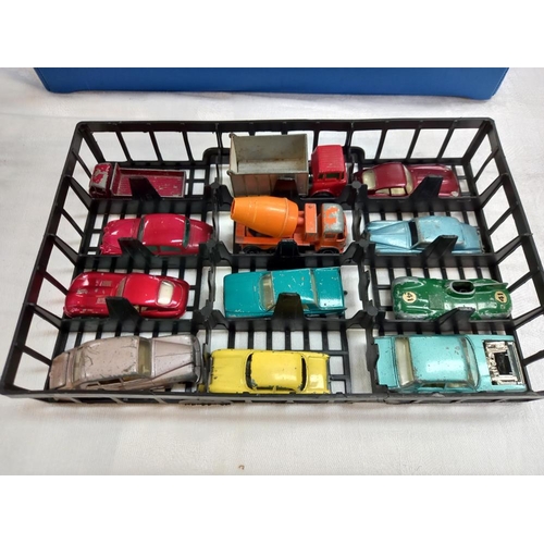 1172 - A Matchbox carry case and contents, lid is a/f