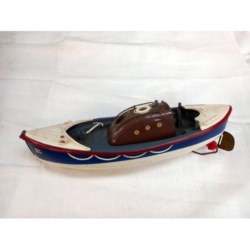 1180 - 2 vintage battery operated boats, RNLI lifeboat and a fishing trawler