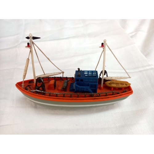 1180 - 2 vintage battery operated boats, RNLI lifeboat and a fishing trawler