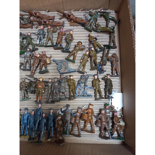 1226 - A large tray of early mainly Britain's soldiers including some with articulated arms