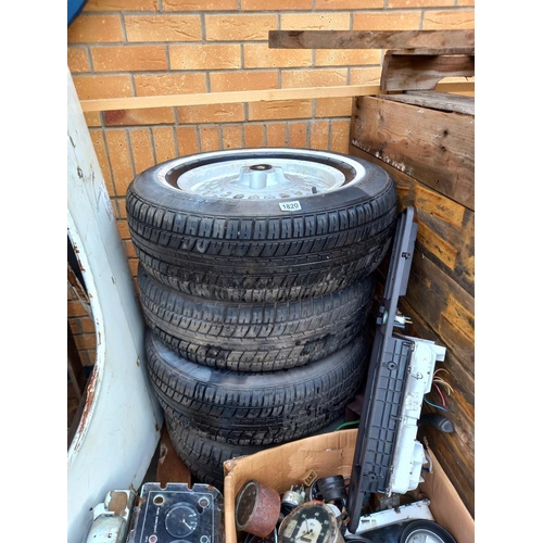 1820 - A set of four Jaguar alloys, 205/70/25 with good tyres, COLLECT ONLY.