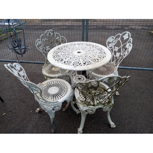 1827 - A vintage cast table and four chairs, COLLECT ONLY.