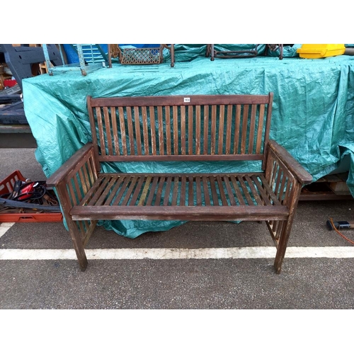 1830 - A good weathered outside garden bench, 129 x 90 cm. COLLECT ONLY.