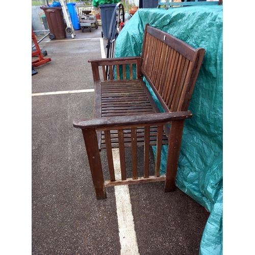 1830 - A good weathered outside garden bench, 129 x 90 cm. COLLECT ONLY.