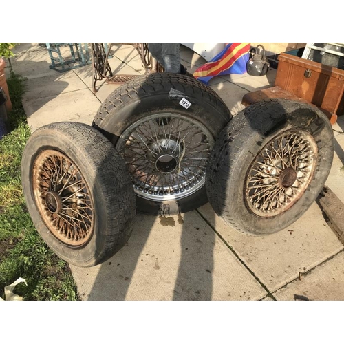 1916 - Three decorative wire wheels, 1 x 15