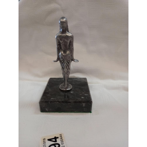 1994 - A figurine of an Egyptian lady on marble base