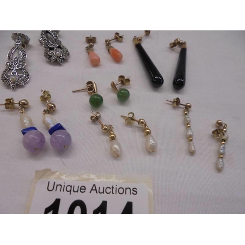 1014 - Six pair of 9ct gold earrings (coral/pearl etc.,) and a pair of marcasite earrings.