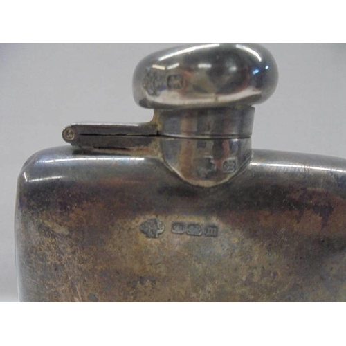 1020 - A hall marked silver hip flask.