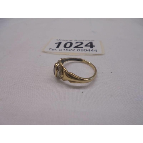 1024 - A 9ct gold sapphire and diamond ring, size M, 1.8 grams.