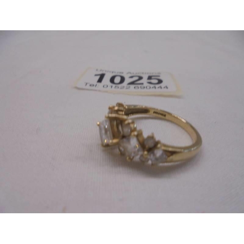 1025 - A 14ct yellow gold twelve stone ring, size P, 4.3 grams.