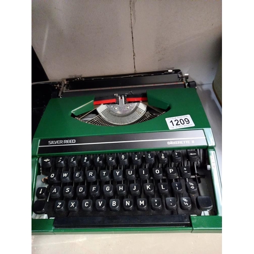 1209 - A silver reed vintage typewriter COLLECT ONLY