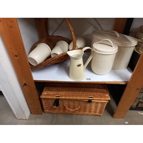 1239 - A wicker picnic basket, flower basket and a kitchen set of bread bin, tea, sugar, coffee & biscuit c... 