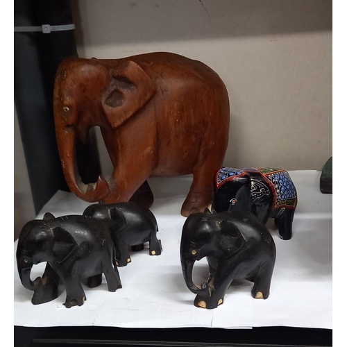 1268 - A quantity of elephants, china dog and an unusual horse and rider figure COLLECT ONLY