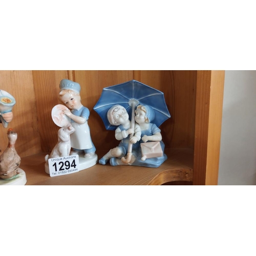 1294 - 4 china figures in the style of Goebel and Lladro