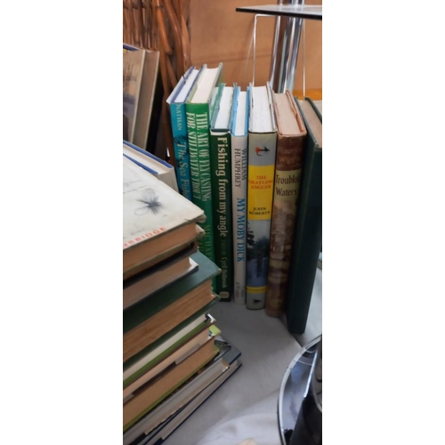 1374 - A large quantity of fishing books COLLECT ONLY