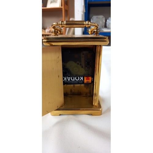 1422 - A Rapport brass mantle clock, battery operated