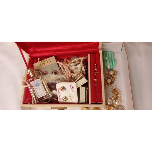 1426 - A jewellery box with contents and large lot of clip on earrings