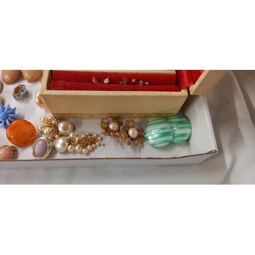 1426 - A jewellery box with contents and large lot of clip on earrings