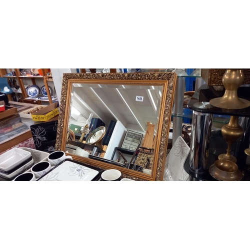 1456 - A gilt framed bevel edged mirror  71cm x 56cm COLLECT ONLY