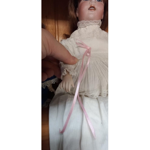 1285 - A German bisque headed doll