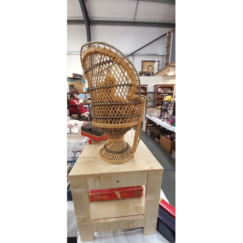 1290 - A small wicker peacock dolls chair and a collectors teddy bear