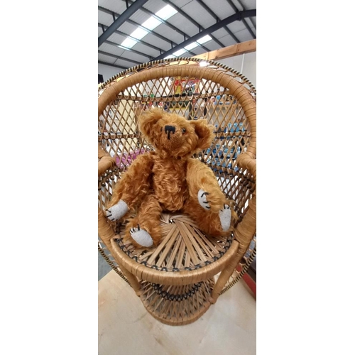 1290 - A small wicker peacock dolls chair and a collectors teddy bear