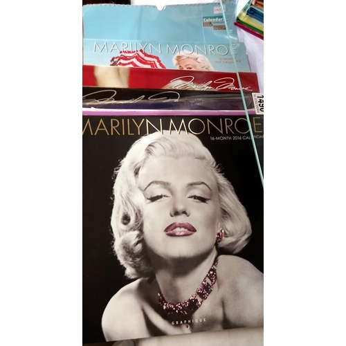 1491 - A collection of Marylin Monroe calendars