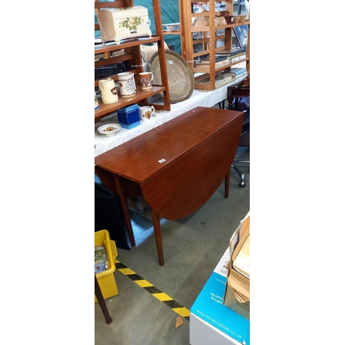 1508 - A dark teak drop leaf dining table COLLECT ONLY