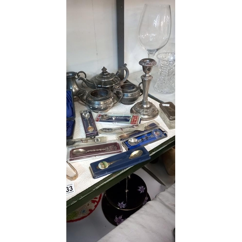 1533 - A large shelf of metalware, silver plate tea set, candlesticks & tourist spoons etc. COLLECT ONLY