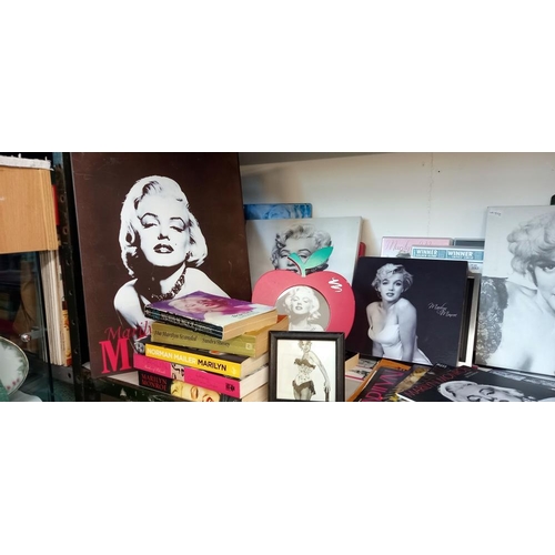 1537 - A mixed lot of Marilyn Monroe photos, small calendar, magazines and DVD's etc COLLECT ONLY