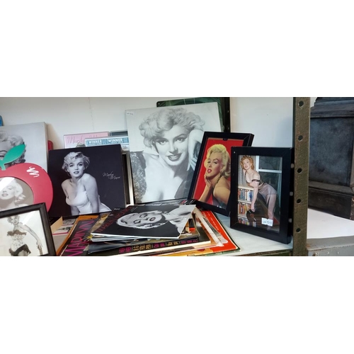 1537 - A mixed lot of Marilyn Monroe photos, small calendar, magazines and DVD's etc COLLECT ONLY