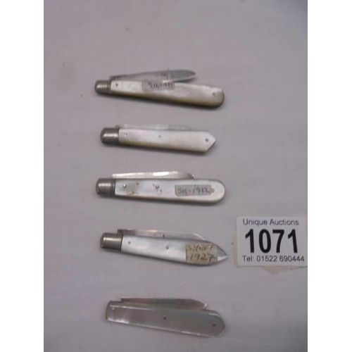 1071 - Five silver and mother of pearl fruit knives.