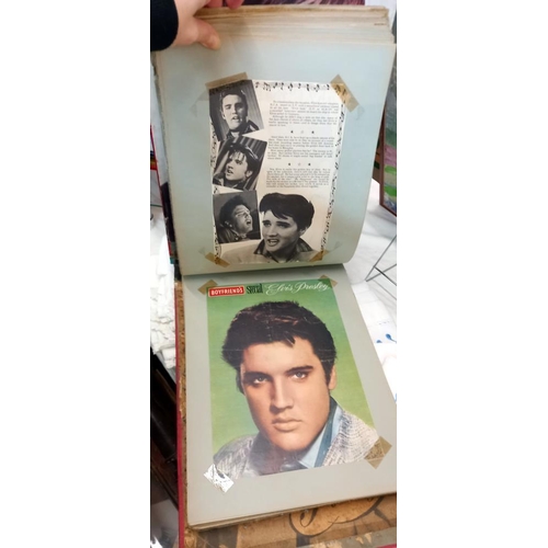 1559 - A quantity of Elvis scrap books and books