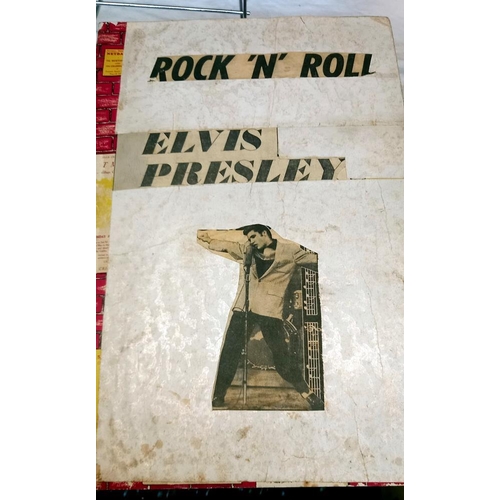 1559 - A quantity of Elvis scrap books and books