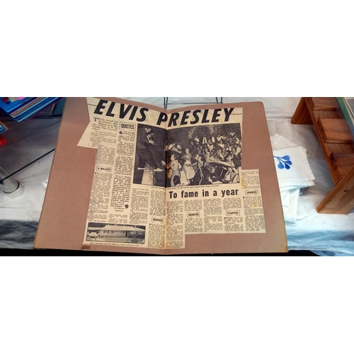 1559 - A quantity of Elvis scrap books and books